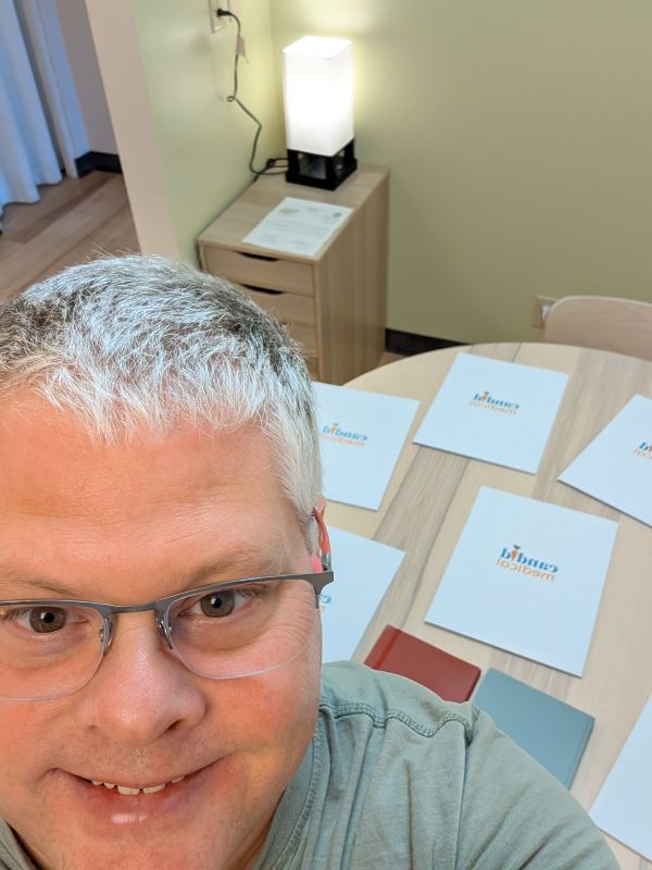 picture of Dr. Joe and a table of folders